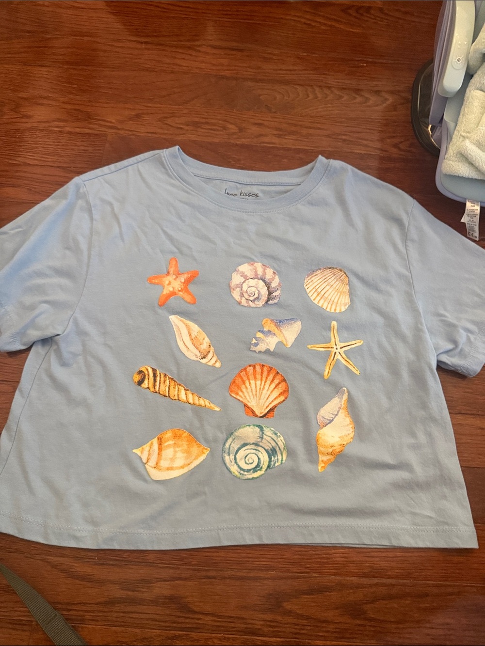 Free Kisses Light Blue Crop Top with Seashell & Starfish Graphics
